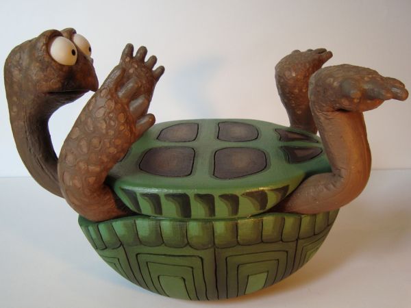 <span>Sun-dried Puppets</span><i>→</i>