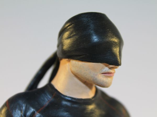 <span>Daredevil Model</span><i>→</i>